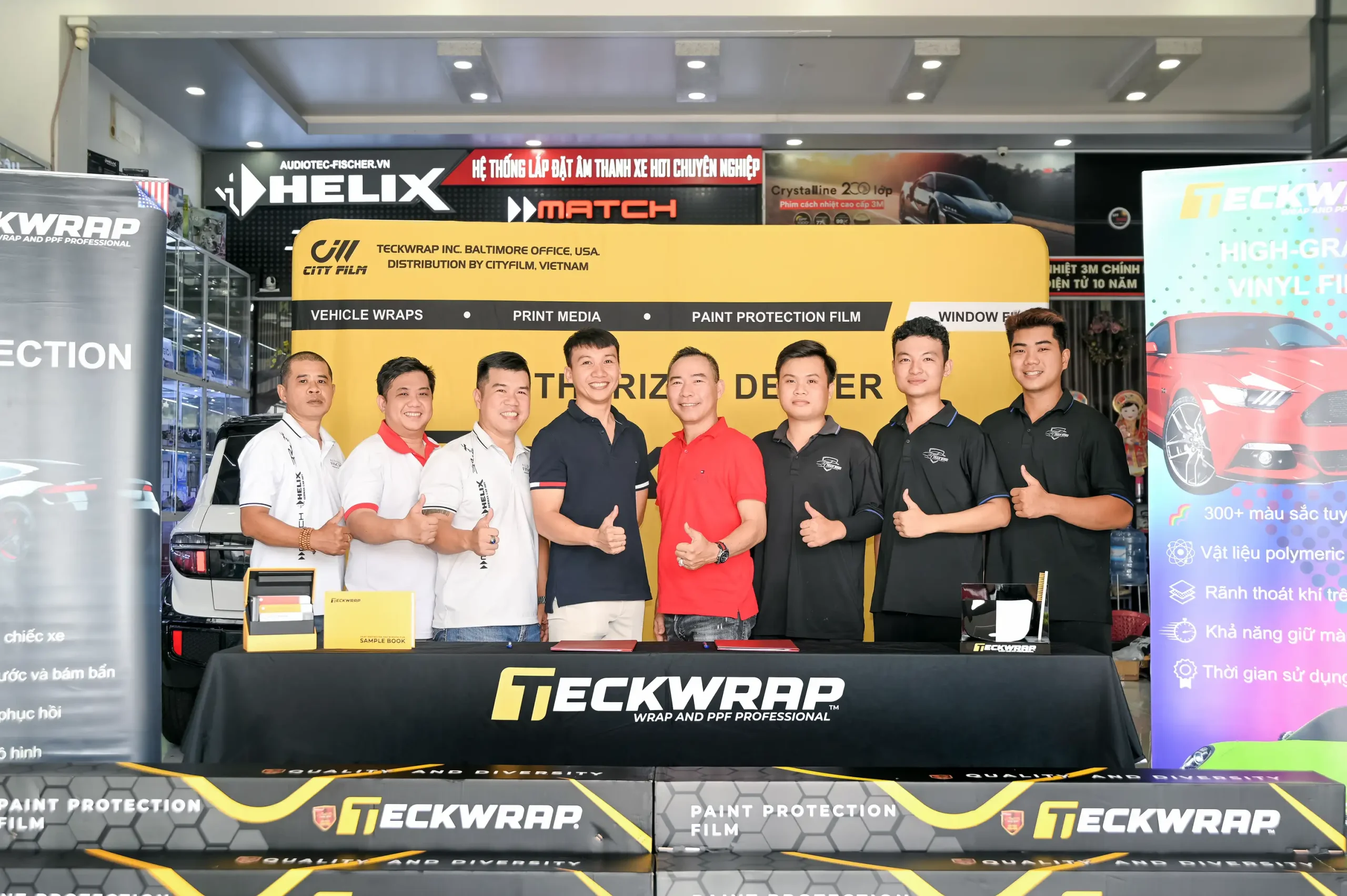 Le ky ket TECKWRAP TRAN BINH scaled Phi Long Auto trở thành Nhà phân phối chính thức PPF TeckWrap tại miền Tây